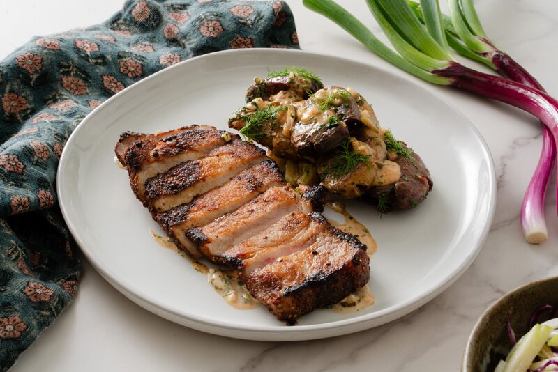 Pastrami Rubbed Pork Chop with Crispy Smashed Potatoes & Russian Dressing
